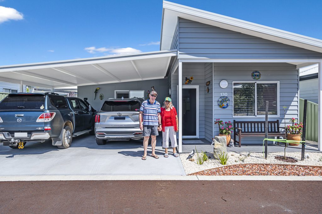 Residents outside their home at Edenlife Communities